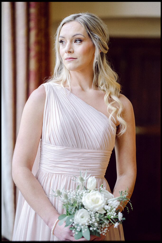 Model Nicole Headworth in Amara Bridesmaid Studio Bridesmaid Dress with Thrive Floristry Flowers. Tracey Davies Photography. Essex Wedding Photographer. 