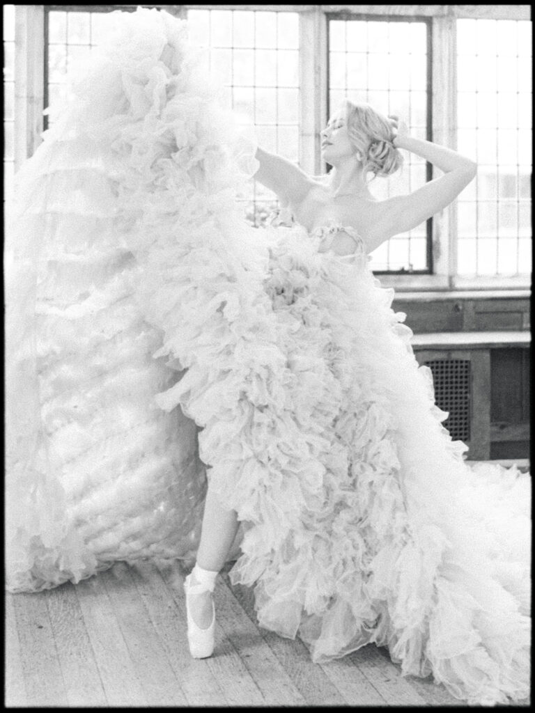 Bride Ballet dancing in Milla London Dress Layer Marney Tower Essex. Tracey Davies Photography. Fine Art Wedding Inspiration. 